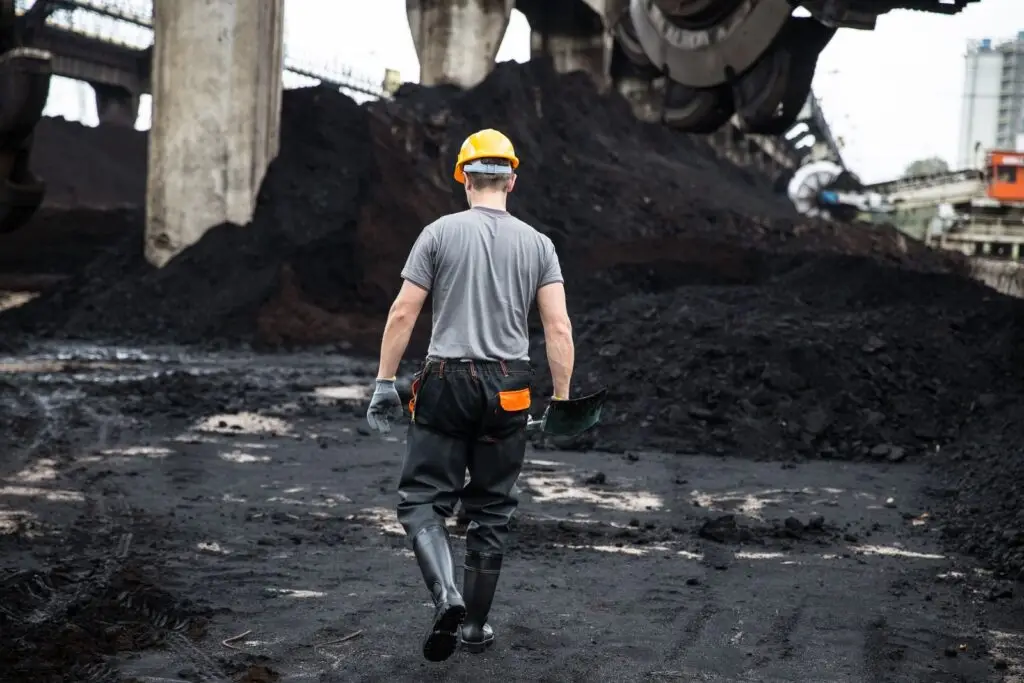 Licensed worker on an industrial construction site - the setting for traveling electrician jobs across the country